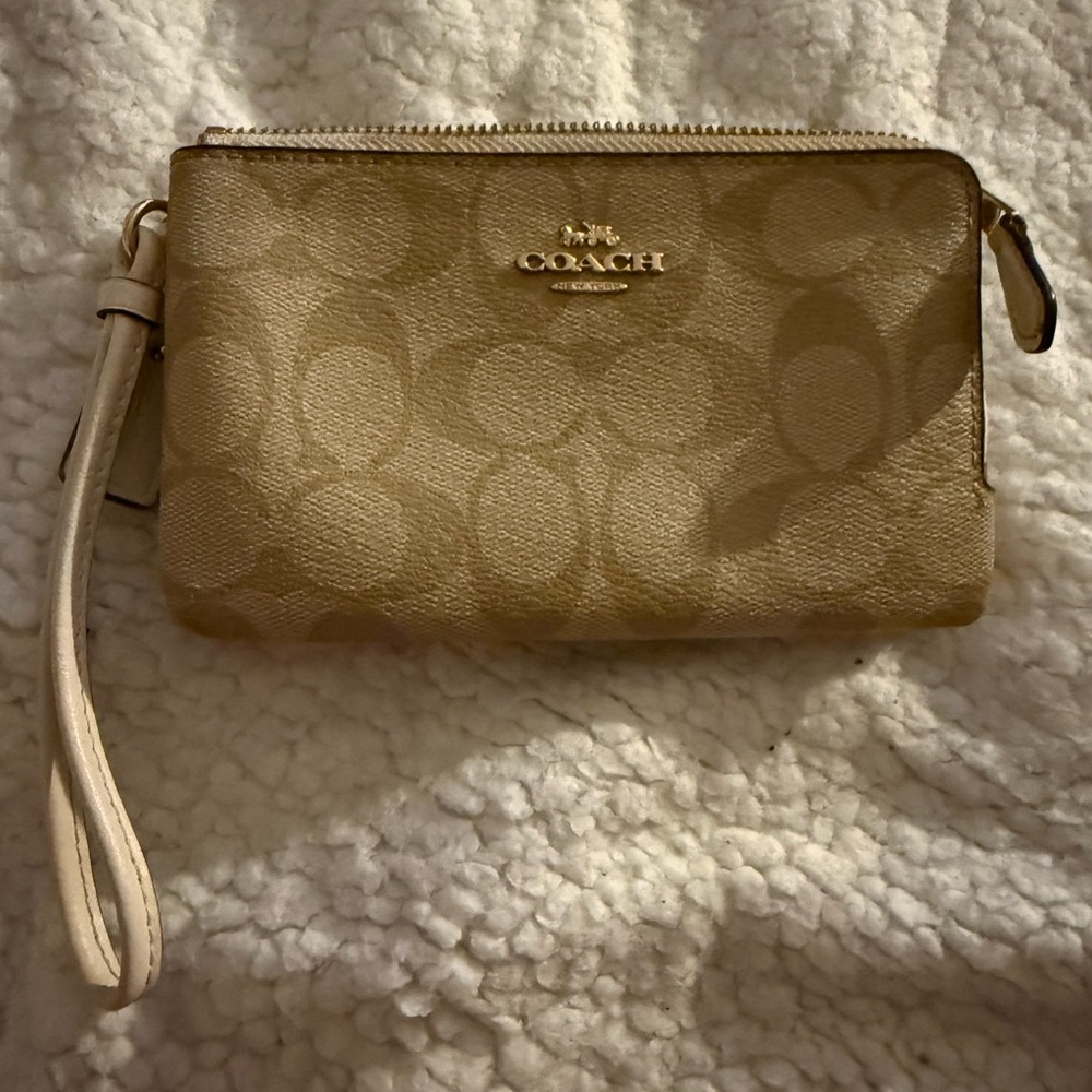 Coach Gold Wristlet with Signature Pattern